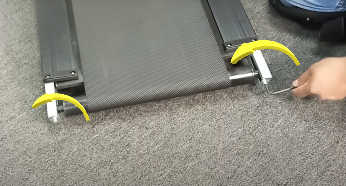 A treadmill on a carpet

Description automatically generated with low confidence